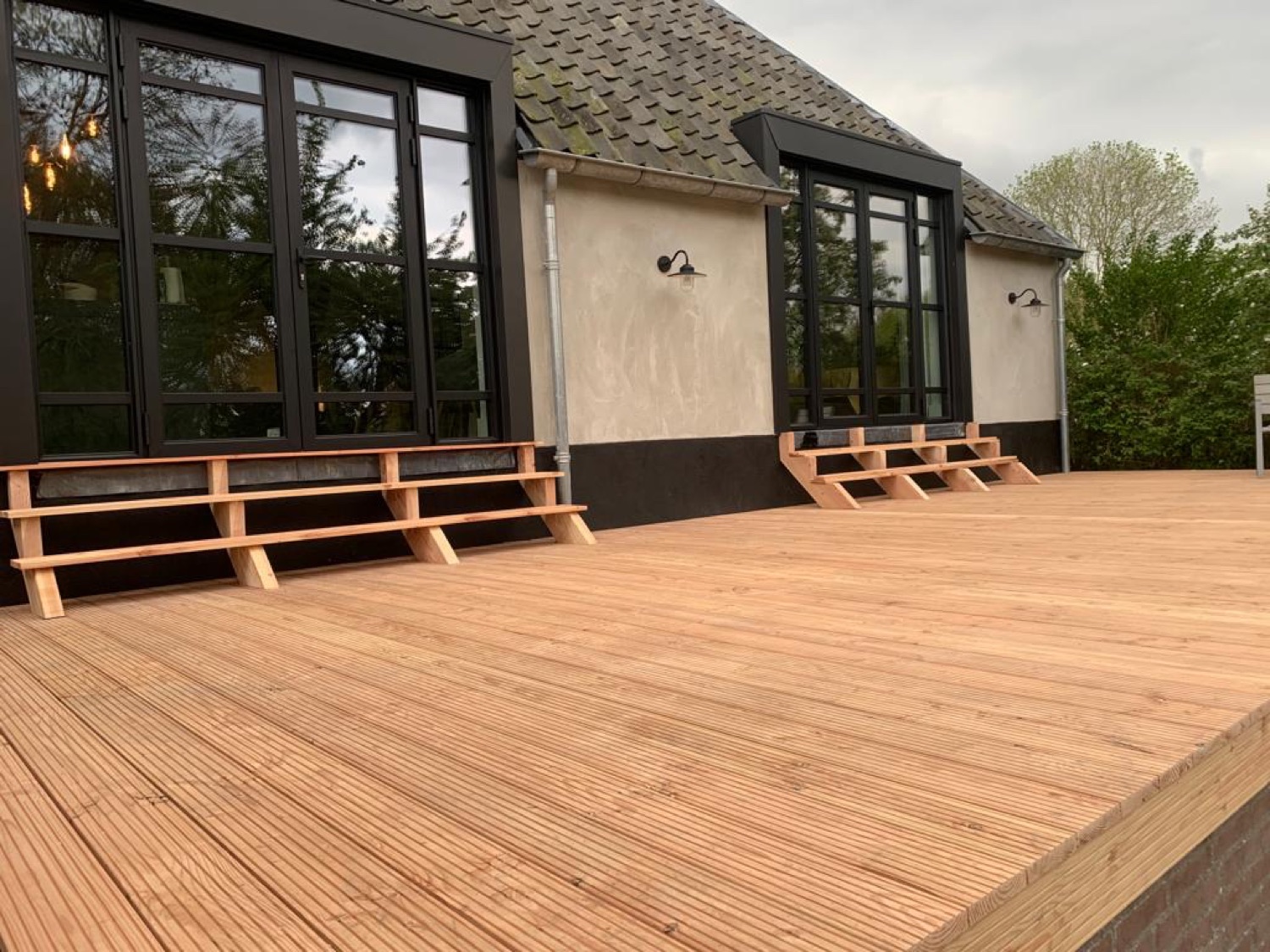 Terras aan het water, tuinproject in Herwijnen e.o.